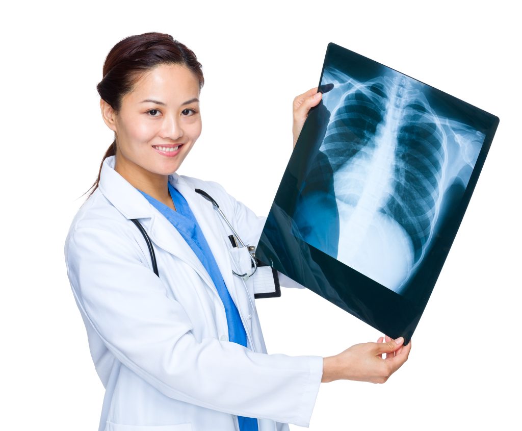 female doctor showing an x-ray