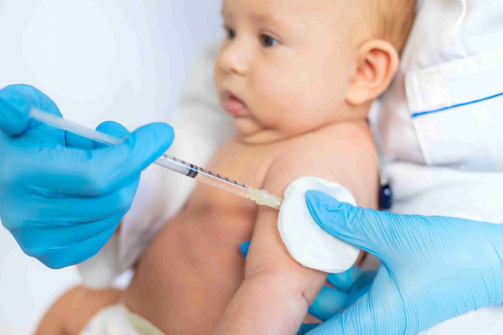 infant getting vaccinated